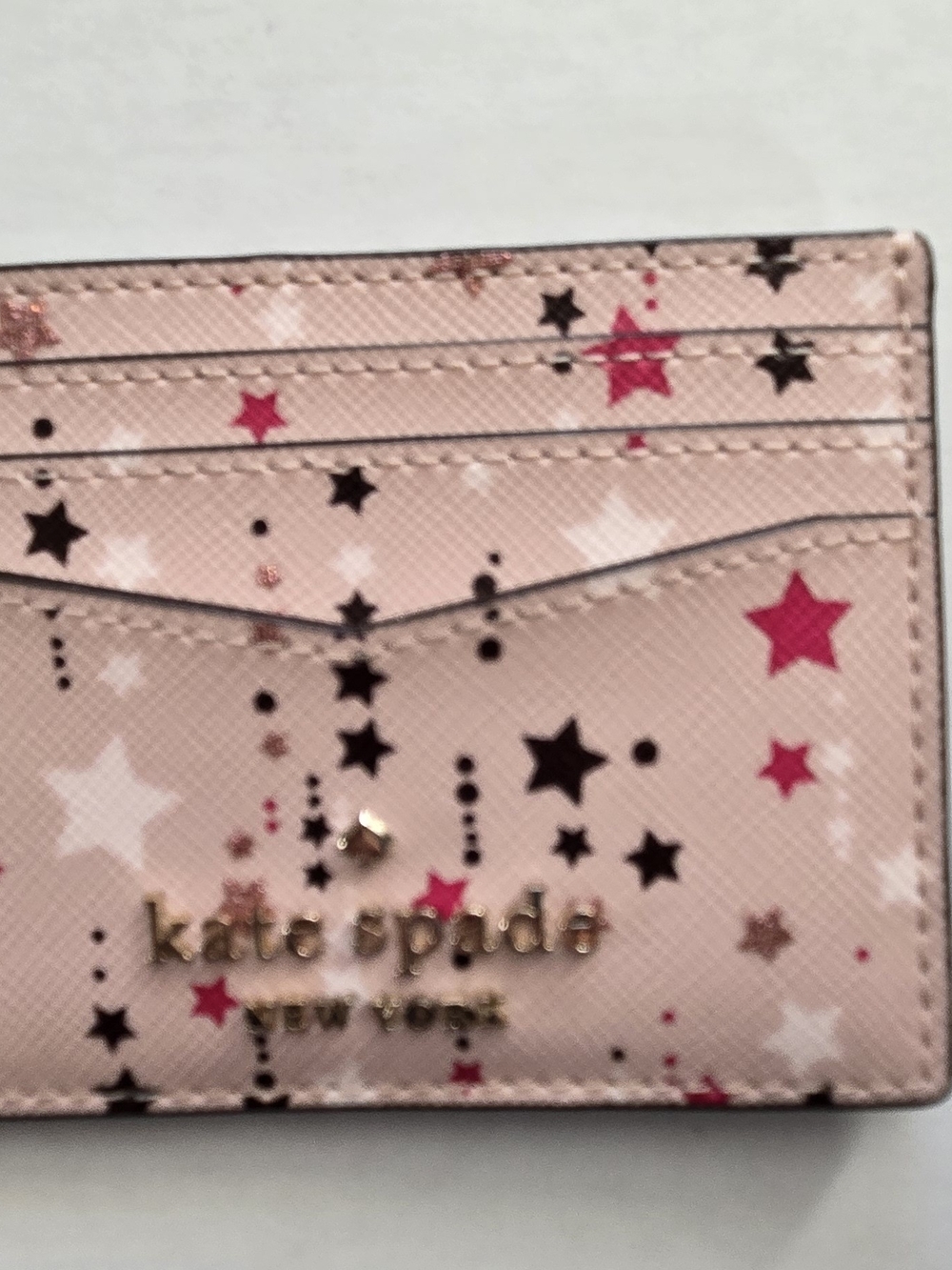 kate spade Pink Star Print Card Holder with Gold Logo